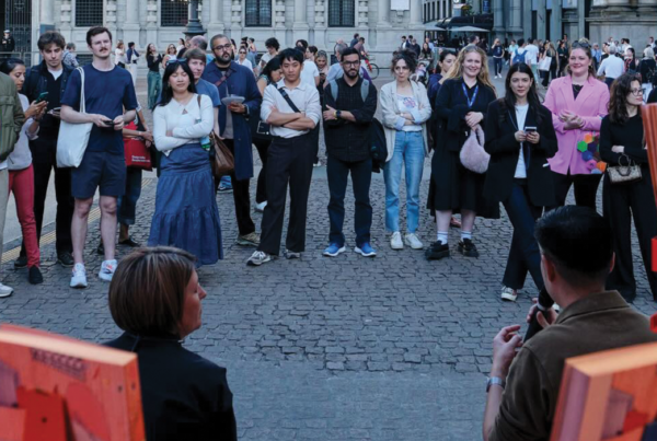 Audience gathering at a Salone del Mobile city event in Milan, reflecting design dialogue, cultural exchange, and public engagement during the international design week