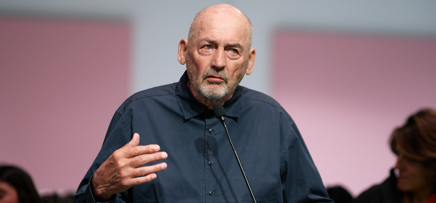 Architect speaking at a design conference panel, reflecting the discussion around Salone Contract 2027, collaborative systems, and the future of large-scale design.